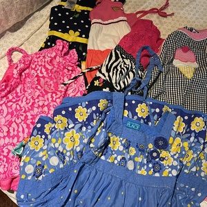 Bundle of size 6 girls clothes.  5 dresses. 1 shirt.